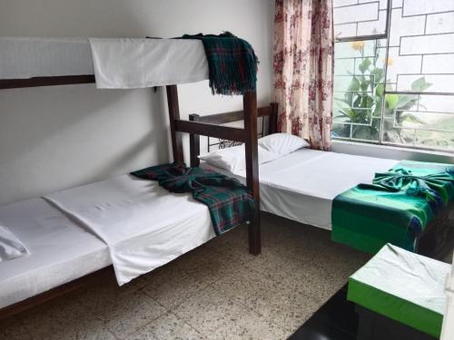 Postel nebo postele na pokoji v ubytování Villa Confort