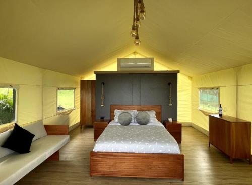 Postel nebo postele na pokoji v ubytování Safari Tent El Cielo