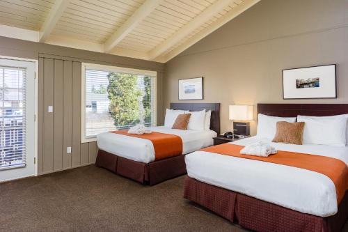 Postel nebo postele na pokoji v ubytování Earthbox Inn & Spa