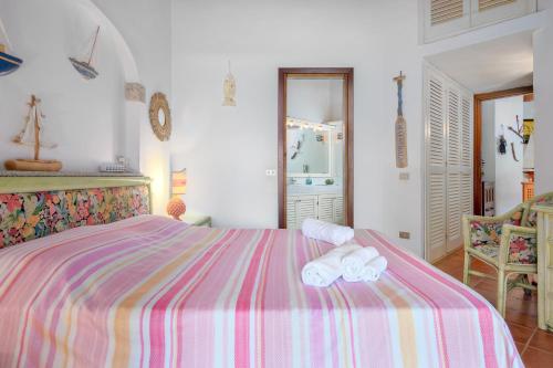 Ένα ή περισσότερα κρεβάτια σε δωμάτιο στο Villa Miramar