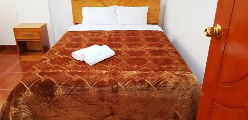 Postel nebo postele na pokoji v ubytování PATAWASI Guest House Cusco