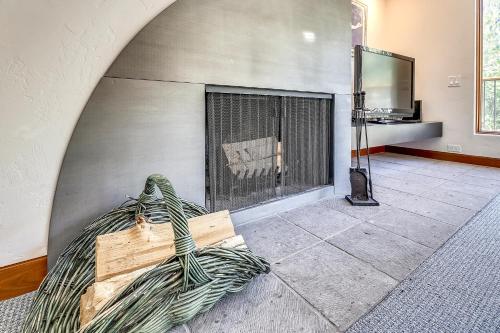 a living room with a fire place in a wall at Spacious Top Floor Condo Aspen in Aspen