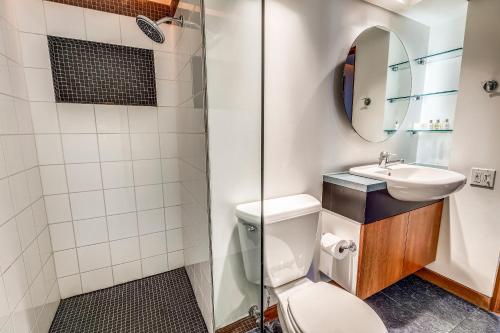 a bathroom with a toilet and a sink at Spacious Top Floor Condo Aspen in Aspen