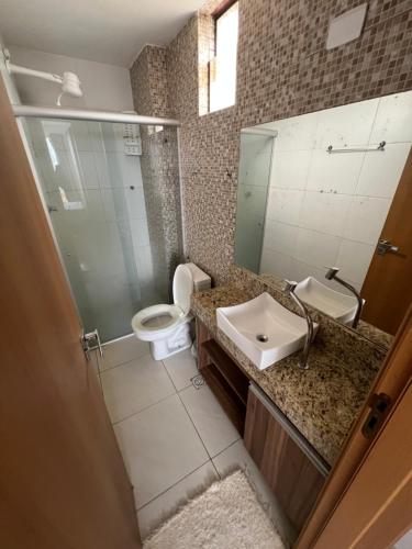 Et badeværelse på Flat alto padrão na melhor localização da cidade