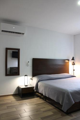 Ένα ή περισσότερα κρεβάτια σε δωμάτιο στο Lofts Las Fuentes