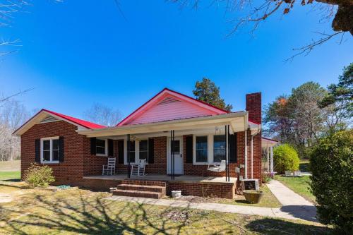 a brick house with a red roof at Red Robin Retreat - Near Lake James, NC in Morganton