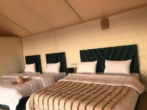 Postel nebo postele na pokoji v ubytování Quad Alia Marrakech