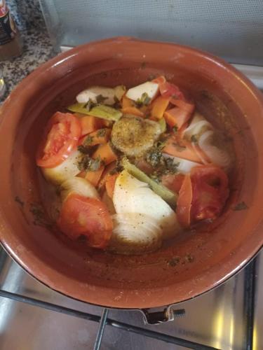 a pot of soup with vegetables in it at Chez Kossai Atlas Farm in Chtawna