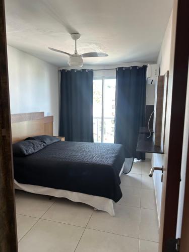 Ένα ή περισσότερα κρεβάτια σε δωμάτιο στο Residencial Lebon Vivant
