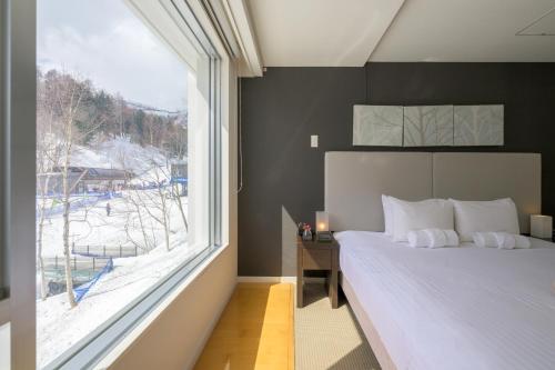 Un ou plusieurs lits dans un hébergement de l'établissement Alpen Ridge
