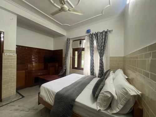 Postel nebo postele na pokoji v ubytování Hotel dev