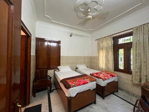 Postel nebo postele na pokoji v ubytování Hotel dev