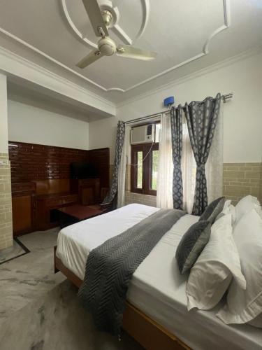 Postel nebo postele na pokoji v ubytování Hotel dev