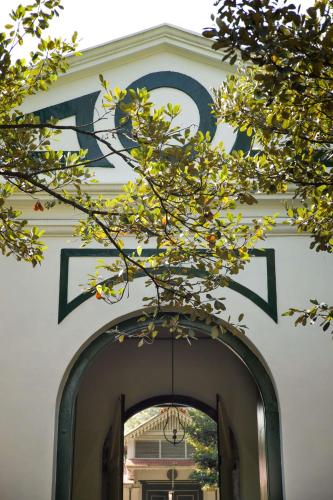 an entrance to a building with an archway at Garrya Bianti Yogyakarta in Yogyakarta
