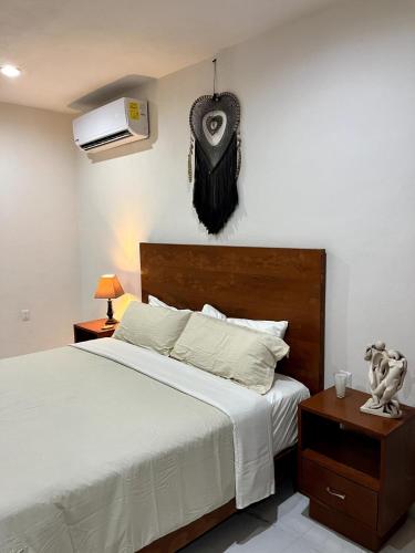 Ένα ή περισσότερα κρεβάτια σε δωμάτιο στο NFT Villa beachfront at Soliman Bay, Tulum