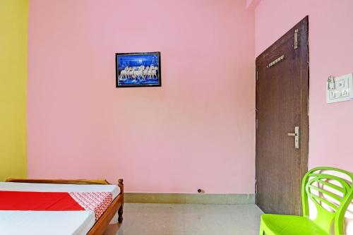 Postel nebo postele na pokoji v ubytování Hotel O Utkal Grand