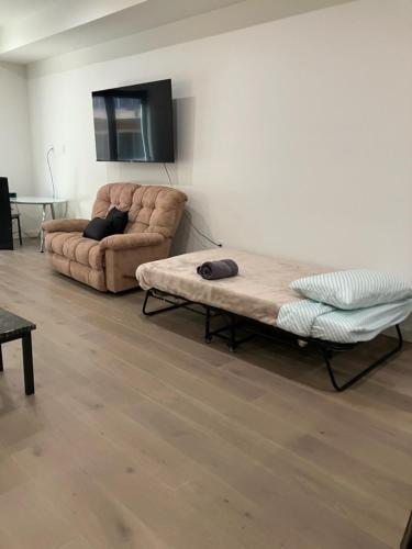 a living room with a couch and a couch and a chair at 912 Brand New Spacious Tonwhome 3br 3ba sleeps 9 in Redwood City