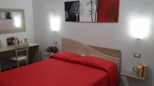 Postel nebo postele na pokoji v ubytování B&B HF Fiorella