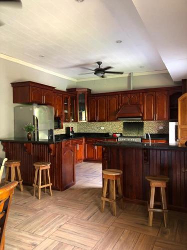 Kuchyň nebo kuchyňský kout v ubytování Hostal Vega