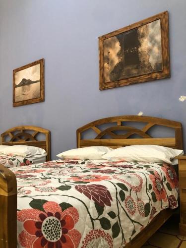 Postel nebo postele na pokoji v ubytování Hostal Vega