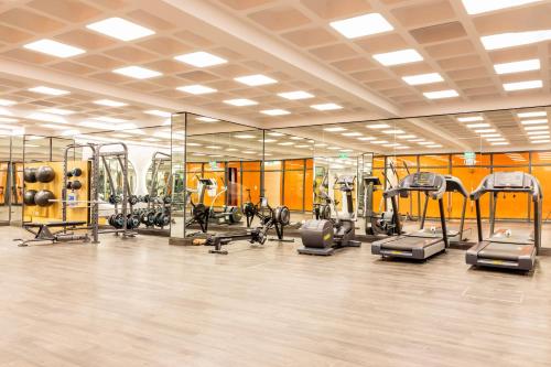 a gym with several treadmills and cardio machines at Sakurakyo Hotel & Spa Phu Quoc - Free Hon Thom Island Waterpark Cable Car Until 15 December 2025 in Phu Quoc