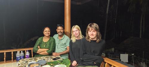 a group of people posing for a picture at Spice Garden Farm house in Sultan Bathery