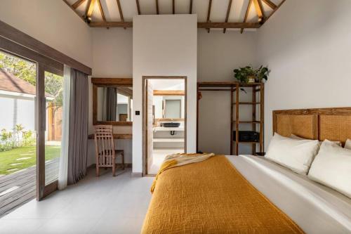 Ένα ή περισσότερα κρεβάτια σε δωμάτιο στο Villa Coco - 2BR Pool Villa