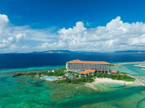an aerial view of a resort on an island in the ocean at Hyatt Regency Seragaki Island Okinawa in Onna