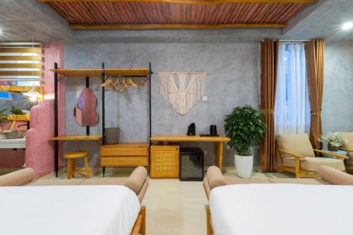 a living room with a couch and a table at Chiu Chiu Resort Đảo Phú Quý in Cu Lao Thu