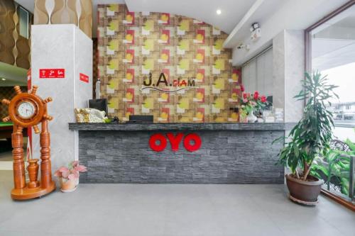 a store front with a counter in a building at Dancenter JA Siam City in Pattaya
