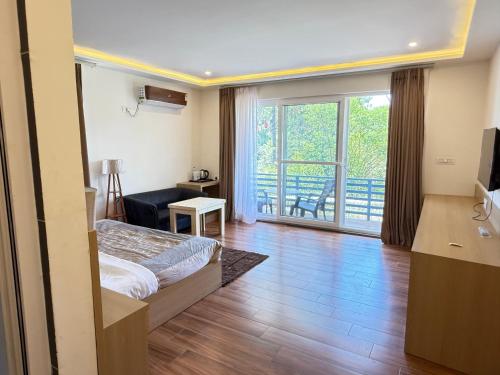 TV a/nebo společenská místnost v ubytování Namlang Resort