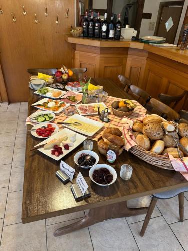 a table topped with lots of different types of food at Gasthof Neusitz in Neusitz