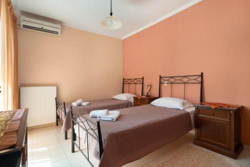 Ένα ή περισσότερα κρεβάτια σε δωμάτιο στο Lakis Superior Apartment