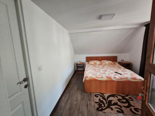 Ένα ή περισσότερα κρεβάτια σε δωμάτιο στο Family&Friends