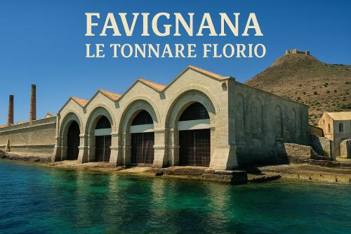 a building next to the water with the words flezlezanca le torrance at SEGESTA Nouveau Bedding in Salemi