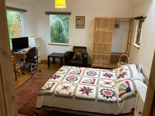 Ένα ή περισσότερα κρεβάτια σε δωμάτιο στο Garden Retreat