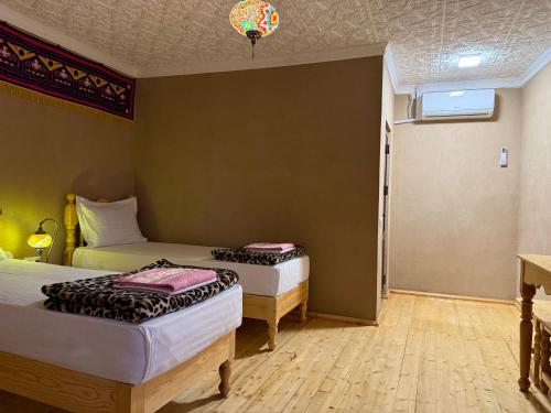 Azaliya Hostelにあるベッド