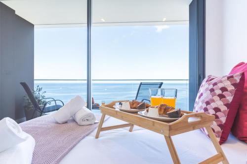 En eller flere senge i et værelse på Mar Apartment by Atlantic Holiday