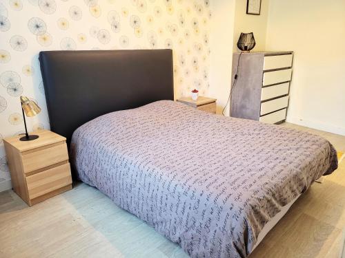 Postel nebo postele na pokoji v ubytování St Jak Appartement