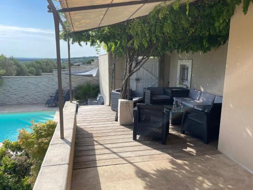 Μπαλκόνι ή βεράντα στο Magnifique villa Chloéline: Piscine et Superbe vue