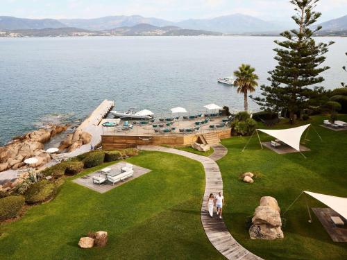 an aerial view of a resort by the water at Sofitel Golfe d'Ajaccio Thalassa Sea & Spa in Ajaccio