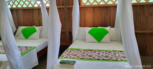 Katil atau katil-katil dalam bilik di Hospedaje Casa Cacicus