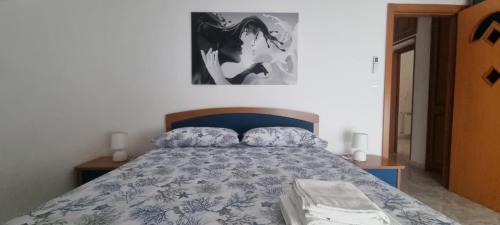 Postel nebo postele na pokoji v ubytování Aqua Apartment