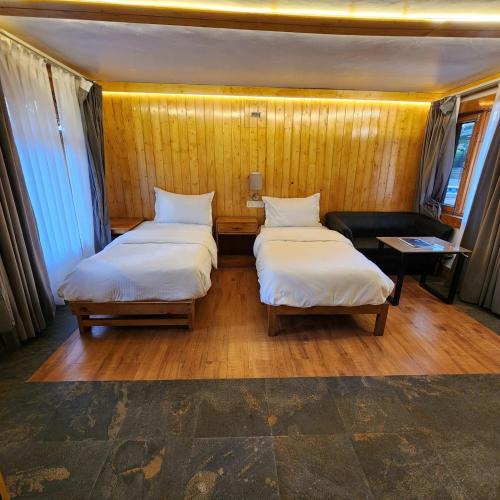Postel nebo postele na pokoji v ubytování Namlang Resort