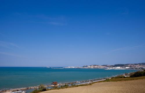 a view of the ocean from the top of a hill at B&B Villa Ngiolò "vista mare" in Ancona