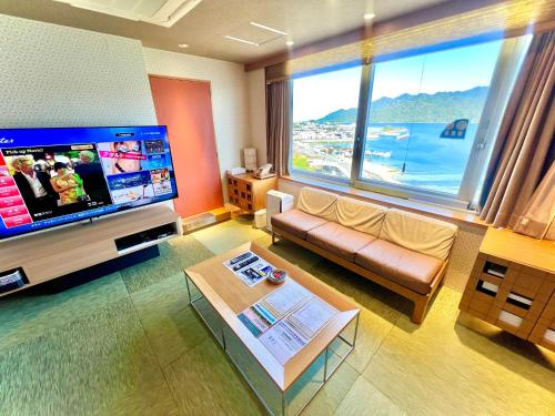 TV a/nebo společenská místnost v ubytování Hotel Aligator -Adult Only-