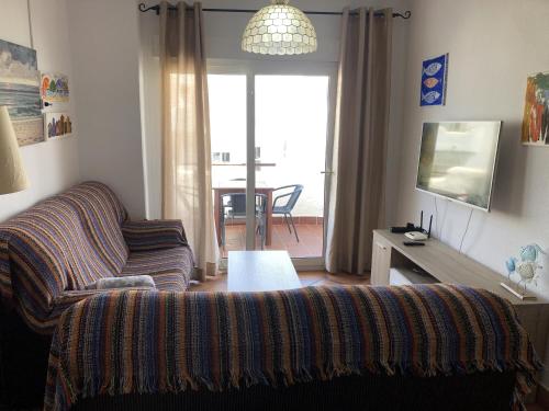Χώρος καθιστικού στο Apartamento en Bahia de Plata Zahara
