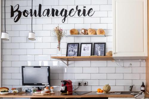 Cuisine ou kitchenette dans l'établissement Artisan Lofts Paris close Eiffel Tower