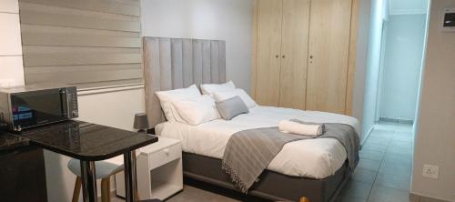 En eller flere senge i et værelse på Gabriaza