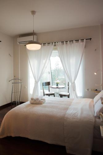 Foto Erasmia's House - A Green Haven for Ultimate Relaxation 5